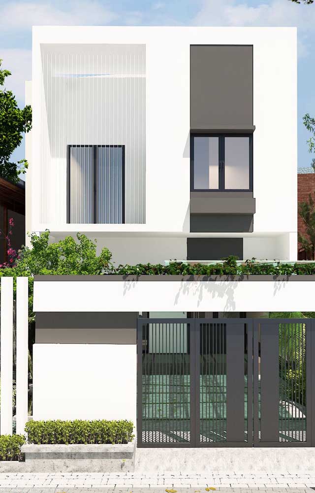 Élégante maison en brique à deux étages avec façade minimaliste