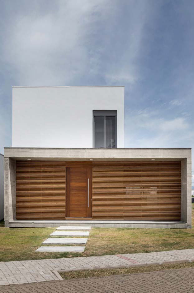 Modèle de maison en bois et béton